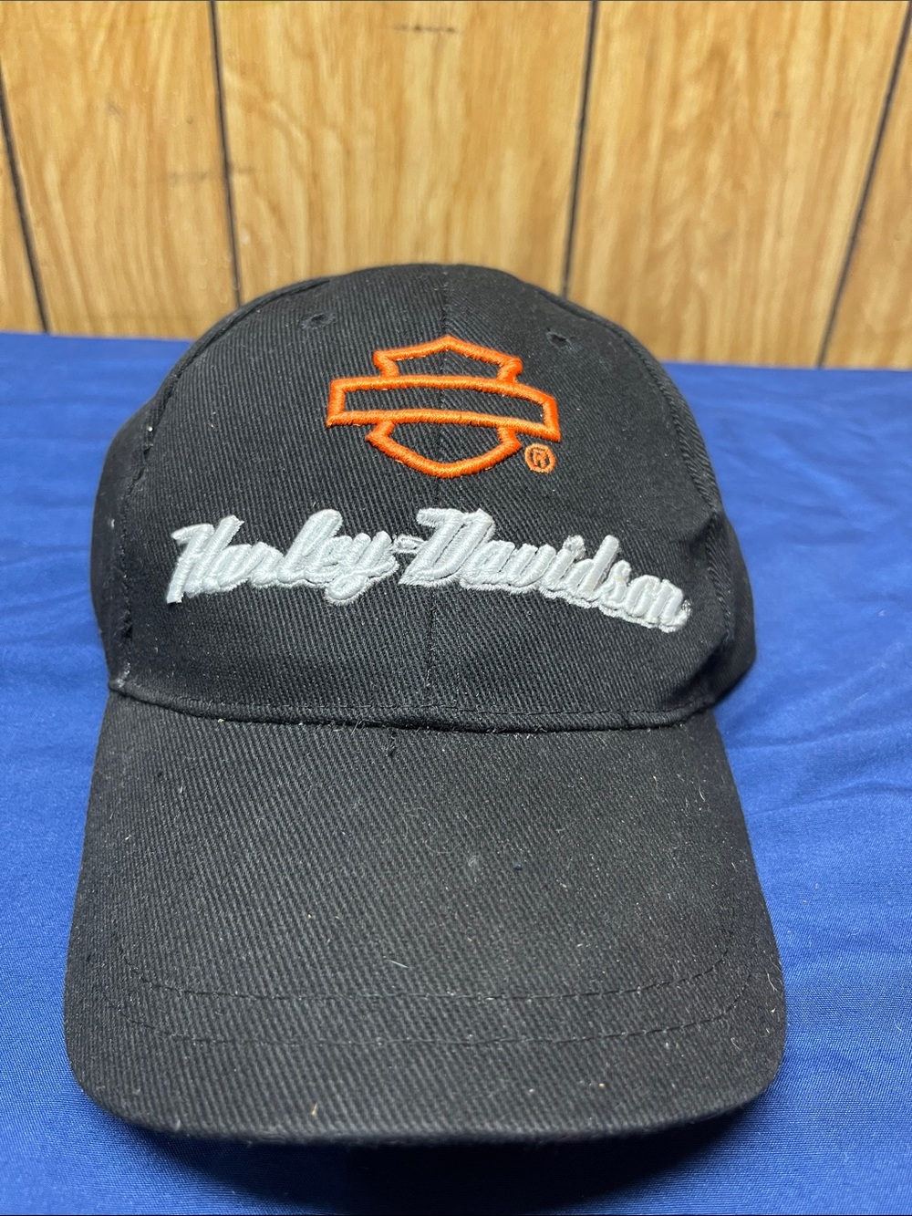 Harley-Davidson Black Cap with Orange Emblem and White Script